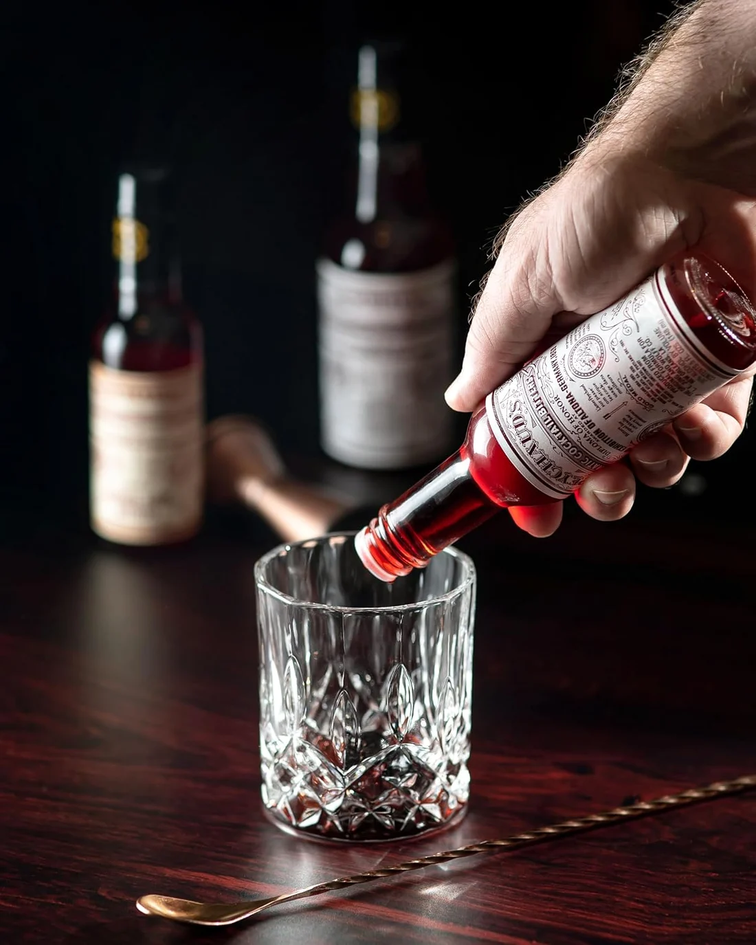 Bottle label or serving context: Aromatic Bitters, Three Pack